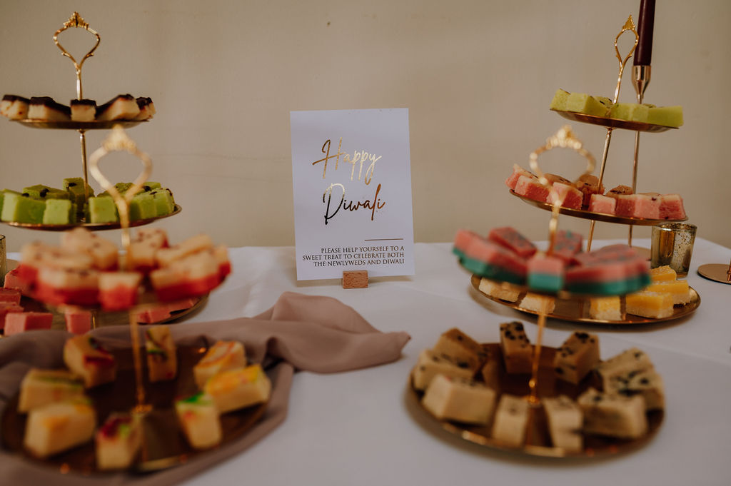 Indian wedding feast with live tandoor station inside the barn